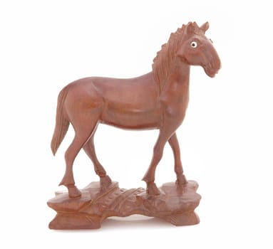 Antique wooden statue of a horse.