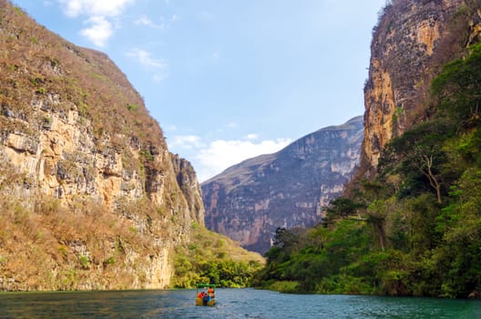 A small boat in the Sumidero Canyon in Chiapas, Mexico