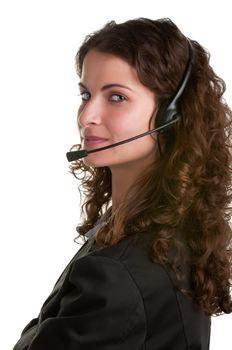 Corporate woman talking over her headset, isolated in a white background