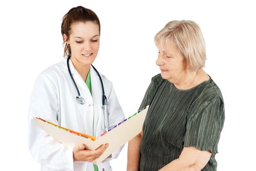 Young female doctor explaning test resutls to her senior woman patient