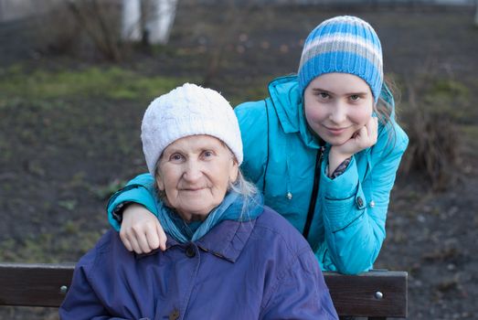 Grandmother and granddaughter for a walk.