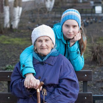 Grandmother and granddaughter for a walk.