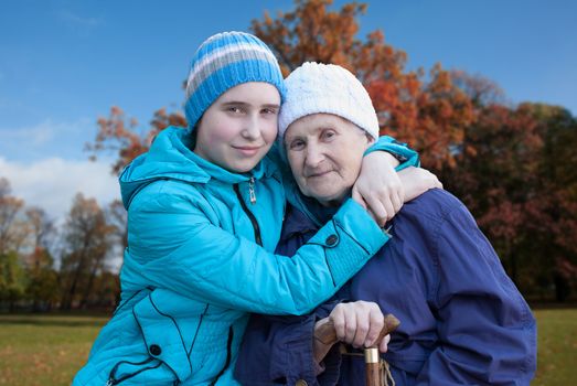 Grandmother and granddaughter for a walk.