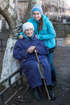 Grandmother and granddaughter for a walk.