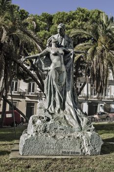 Bronze replica to stone original monument to writer Eça de Queirós (Teixeira Lopes 1903) at Bairro Alto district in Lisbon