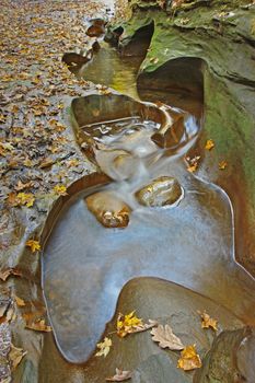 Potholes in Fall Creek Gorge, a Nature Conservancy Property in Warren County, Indiana vertical