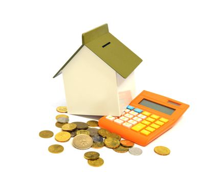 House, calculator and coins, buying property concept