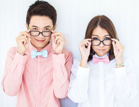 Happy Couples in living room with smart casual dress