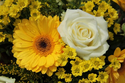 White and yellow bouquet, geberas and roses