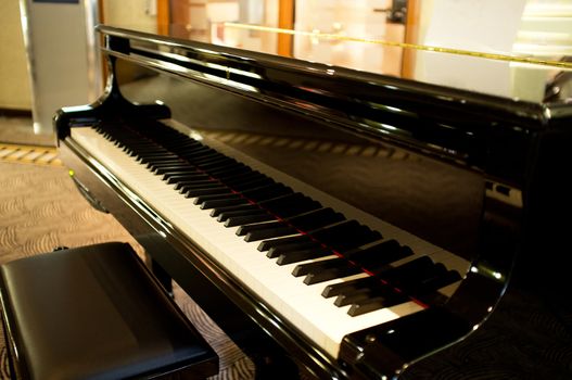 Let's play some melody. Closeup shot of a piano in the lounge