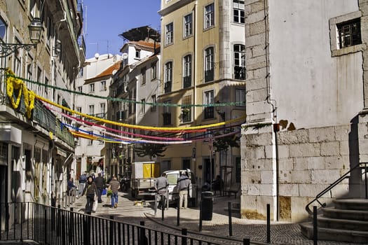 Traditional street at popular Alfama district of Lisbon