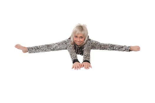 beautiful woman in a leopard-print dress does exercises