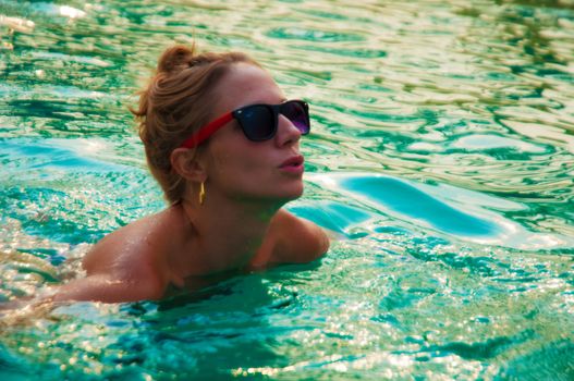 Girl swimming in pool