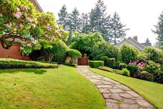 Spring garden and pathway near home. American Northwest. End of May.