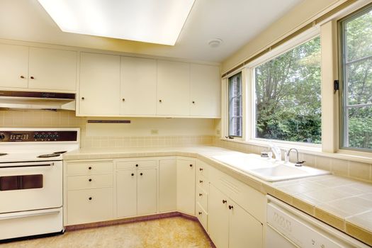 White empty simple old kitchen interior in American historical house.