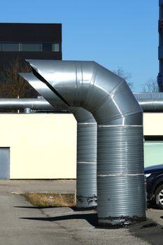 Greater pipes of ventilation are near a building