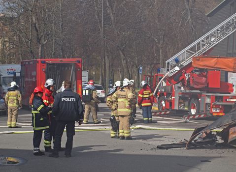 COPENHAGEN - APR 28: Police and firemen at The Museum of Danish Resistance 1940 -1945 on April 28, 2013 in Copenhagen, Denmark. It took 10 hours to put off the fire which started at 1:45 A.M.
