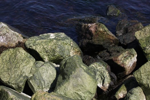 heap of boulders at seaside