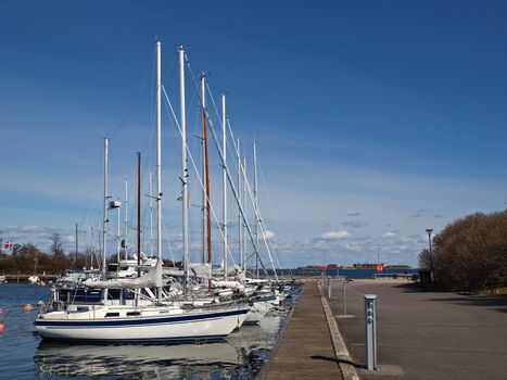 sailboats moored at langelinie marina in copenhagen, denmark