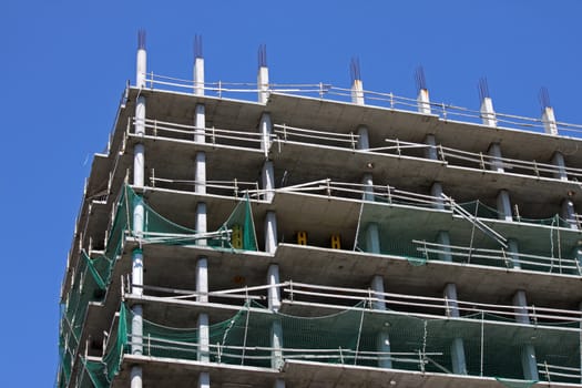 building under construction over blue sky