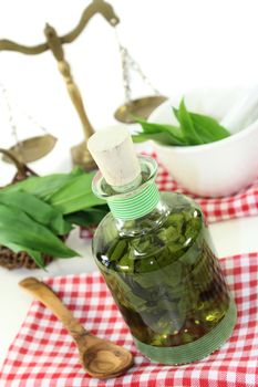 a bottle garlic tincture on a white background