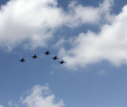 Israeli Air Force airplanes (five jet fighters) at parade in honor of Independence Day