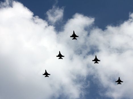 Israeli Air Force airplanes (five jet fighters) at parade in honor of Independence Day