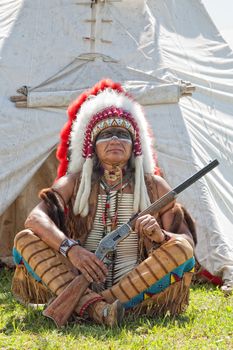 North American Indian in full dress. Reconstruction