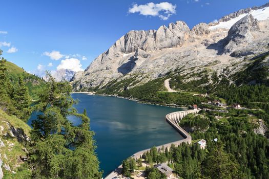 summer view of mount Marmolada and Fedaia lake, Trentino, Italy
