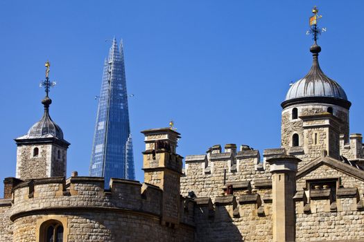 The historic Tower of London with the Shard in the background.