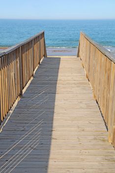 Walkway to a public beach access in Nags Head on the Outer Banks of North Carolina vertical