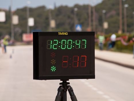 electronic timer and display on tripod ready for car racing