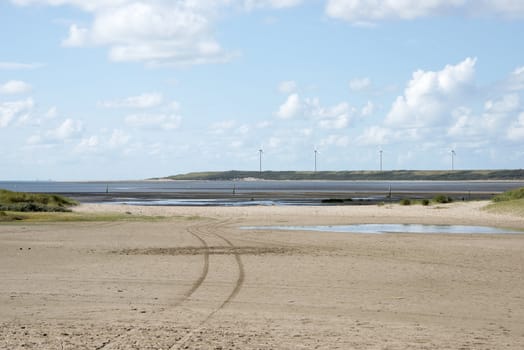 Dutch landscape with windmills near europoort harbor
