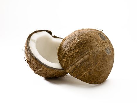 A split coconut on a white background