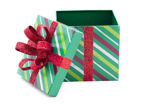 View of empty green Christmas gift box over white background.