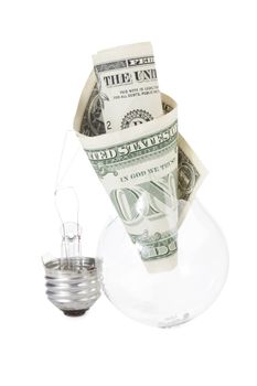 Close up image of light  bulb with dollar against white background