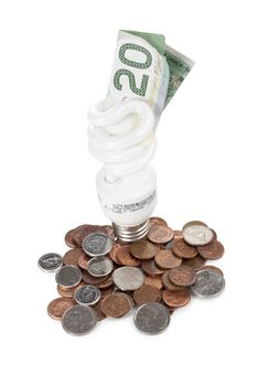 Image of a light bulb and currency with a concept of conserving electrical energy