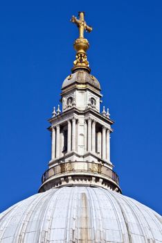Close-up shot of the spire of St. Paul's Cathedral in London.