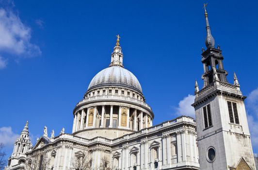 St. Paul's Cathedral and the Tower of the former St. Augustine Church (now the St. Paul's Cathedral Choir School) in London.