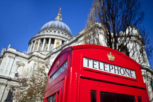 An iconic British Red Telephone Box outside St. Paul's Cathedral in London