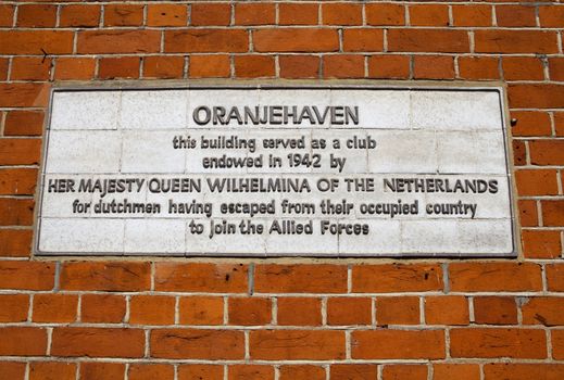 Plaque in Hyde Park Place marking the site of 'Oranjehaven' - a club during the Second World War used by dutch people who fled Nazi Germany and joined the Allied forces.