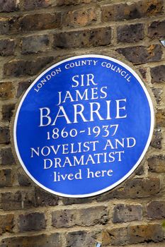 Sir James Barrie blue plaque marking his former London residence.
