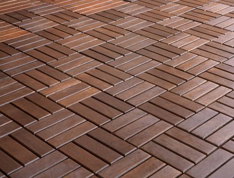 Parquet texture dark red-brown in color, folded in a staggered