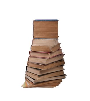 A few old books, stacked, isolated on a white background