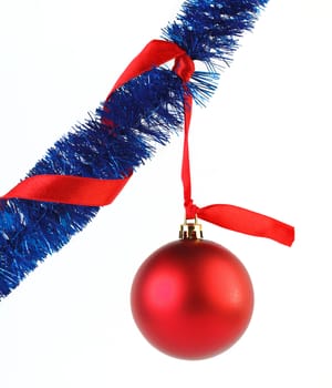 Red  ball and red ribbon isolated on white