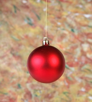 Red ball on abstract background