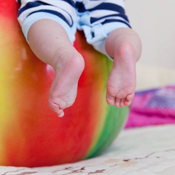 Baby feet on the ball