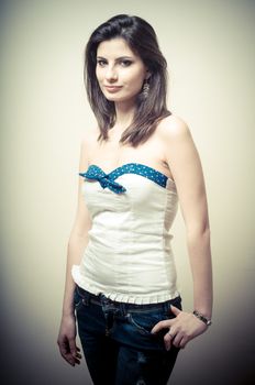 vintage portrait of young woman on vignetting background