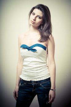 vintage portrait of young woman on vignetting background