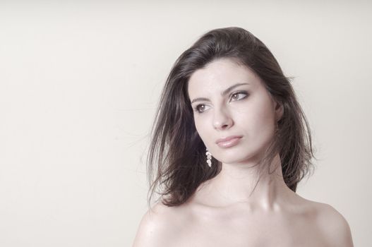 vintage portrait of young woman on vignetting background